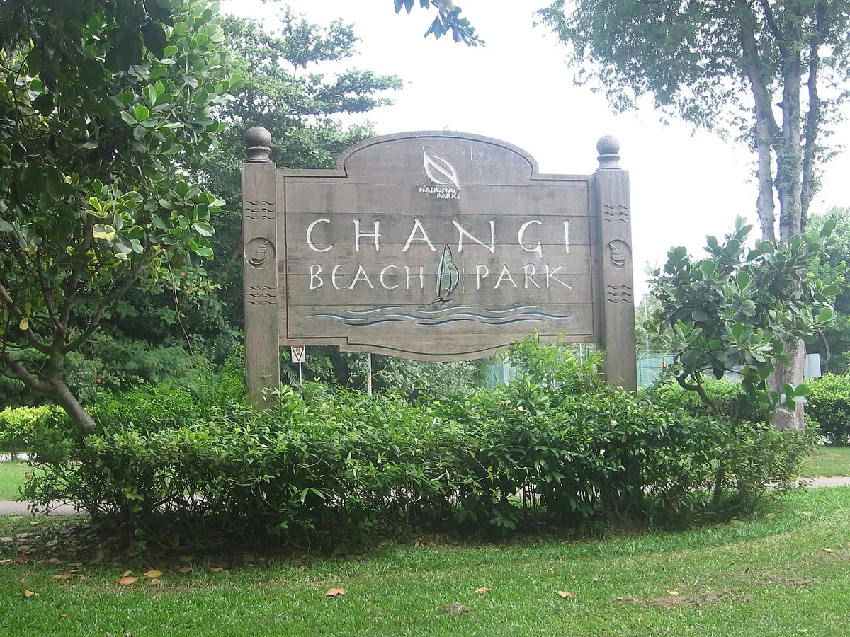 The sandy shore and trees of Changi Beach Park in eastern Singapore