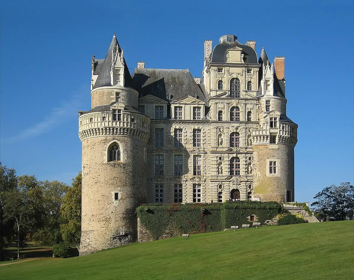 The Château de Brissac’s entrance front with its two medieval round towers and tall 17th-century centre