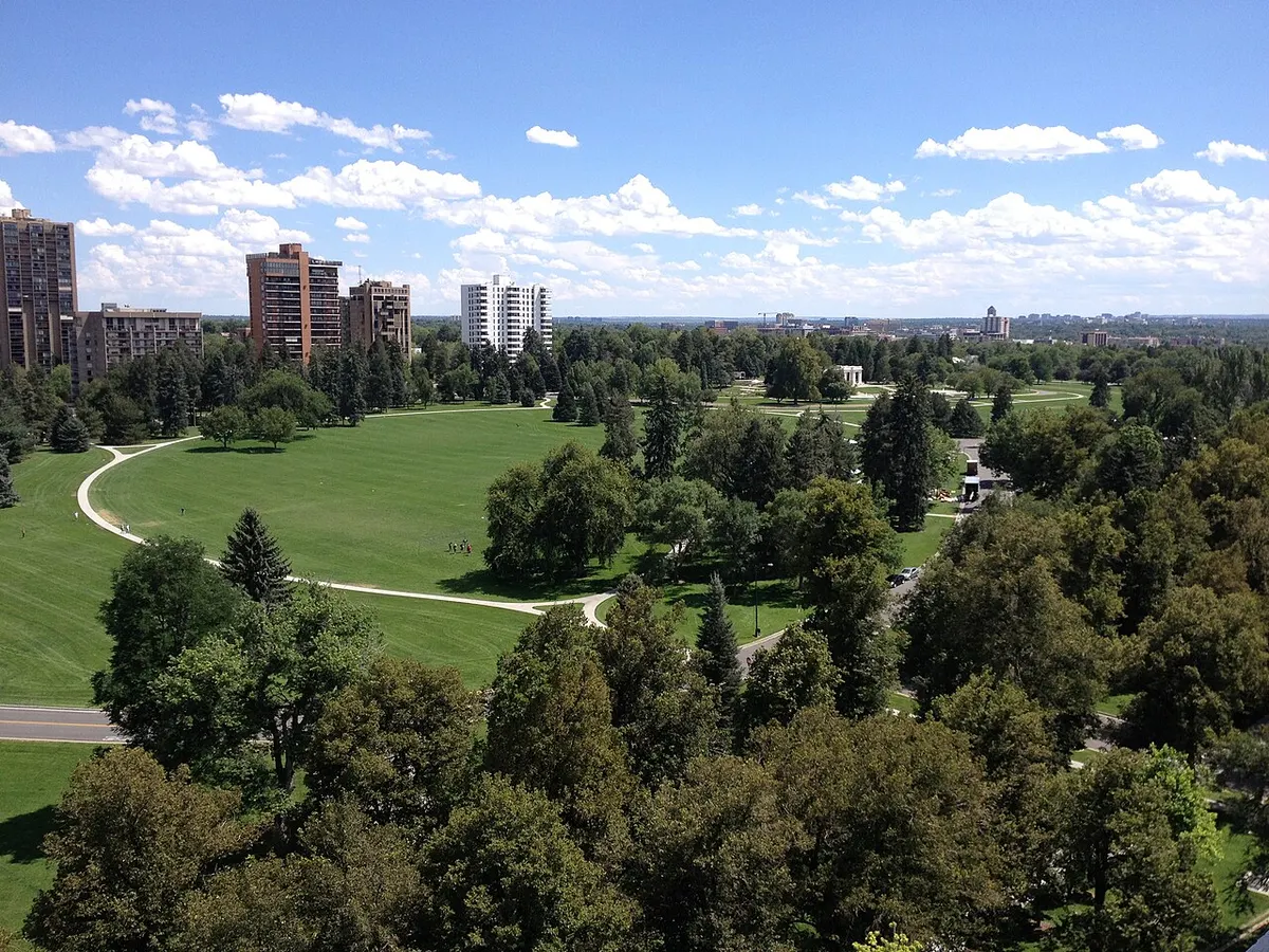 Lawns and trees of Cheesman Park in Denver seen from its north-west corner