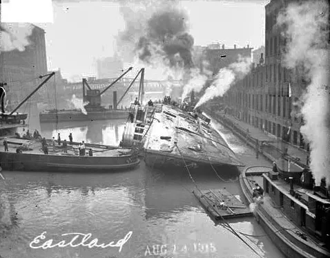The steamer Eastland being righted after capsizing in the Chicago River in 1915