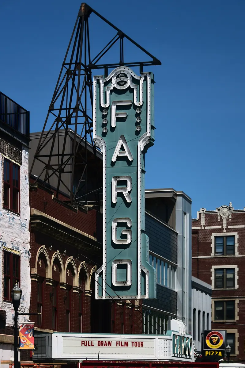 The vertical FARGO sign and marquee of the Fargo Theatre in downtown Fargo