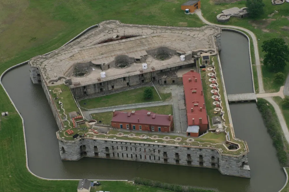 Aerial view of the five-sided granite Fort Delaware and its moat on Pea Patch Island