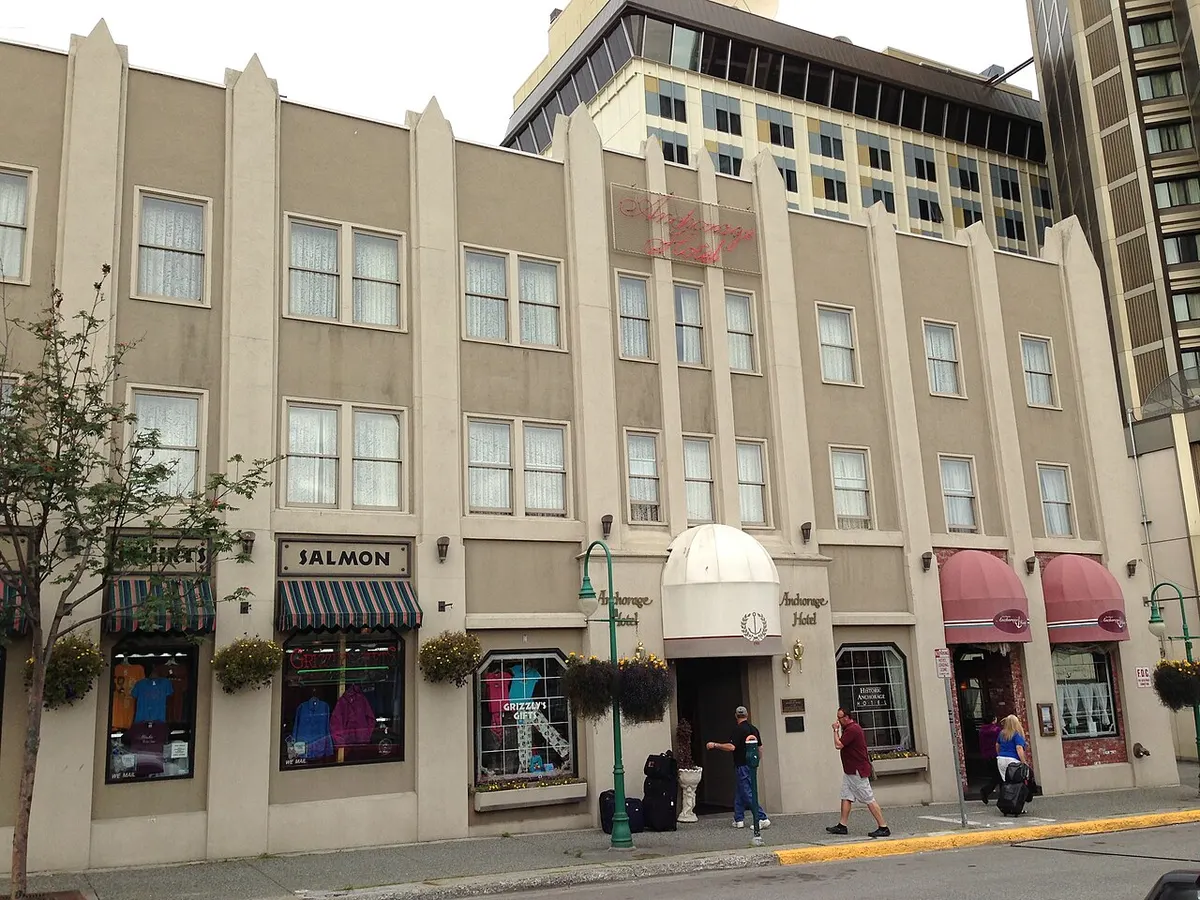 The Historic Anchorage Hotel, a three-storey 1936 building on a downtown Anchorage street corner