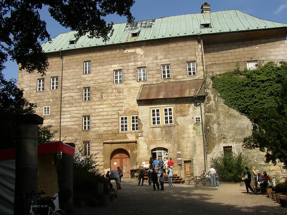 Houska Castle rising above the trees on its sandstone cliff in northern Bohemia
