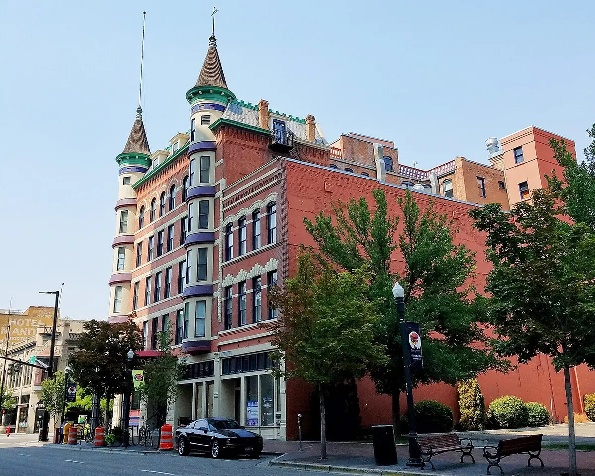 The red-brick Idanha Hotel with its corner turrets and mansard roof on West Main Street in Boise