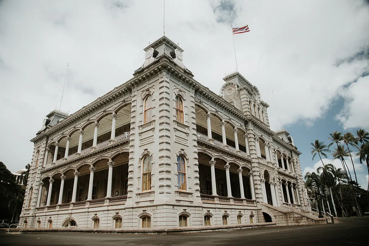 The front of ʻIolani Palace in Honolulu, with its two-storey verandas and towers