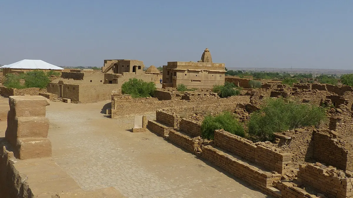 Rows of roofless sandstone houses in the abandoned village of Kuldhara near Jaisalmer