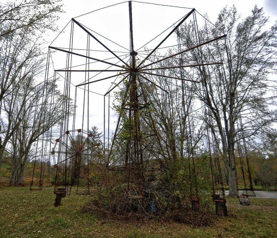 The rusting swing ride at the abandoned Lake Shawnee Amusement Park