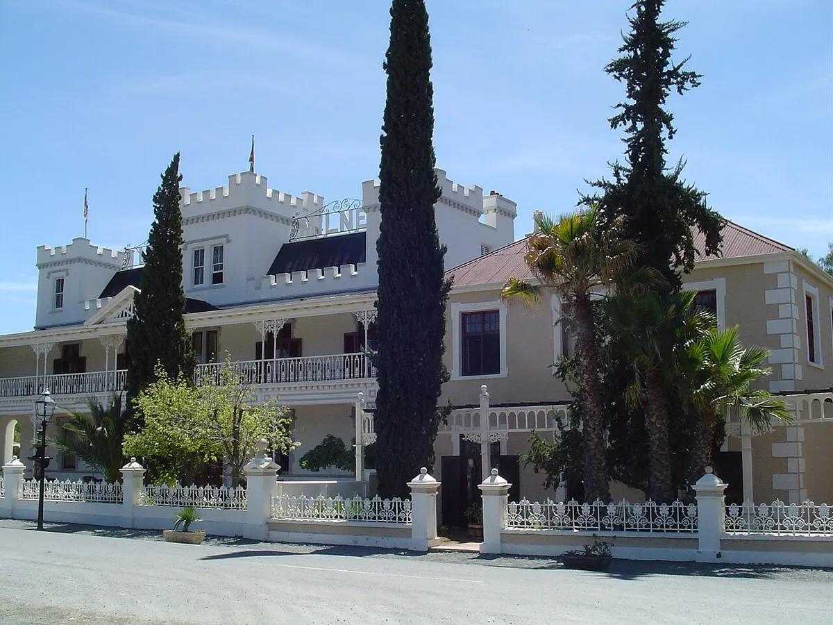 The white Victorian Lord Milner Hotel with its corner turret in Matjiesfontein