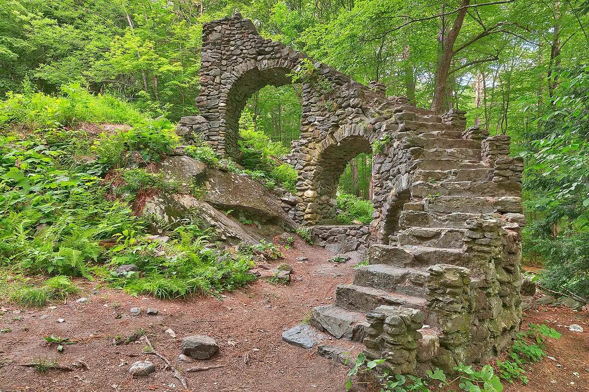The stone staircase ruins of Madame Sherri’s Castle in the forest at West Chesterfield