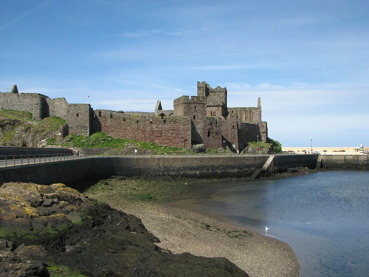 The red sandstone walls and towers of Peel Castle on St Patrick’s Isle, Isle of Man