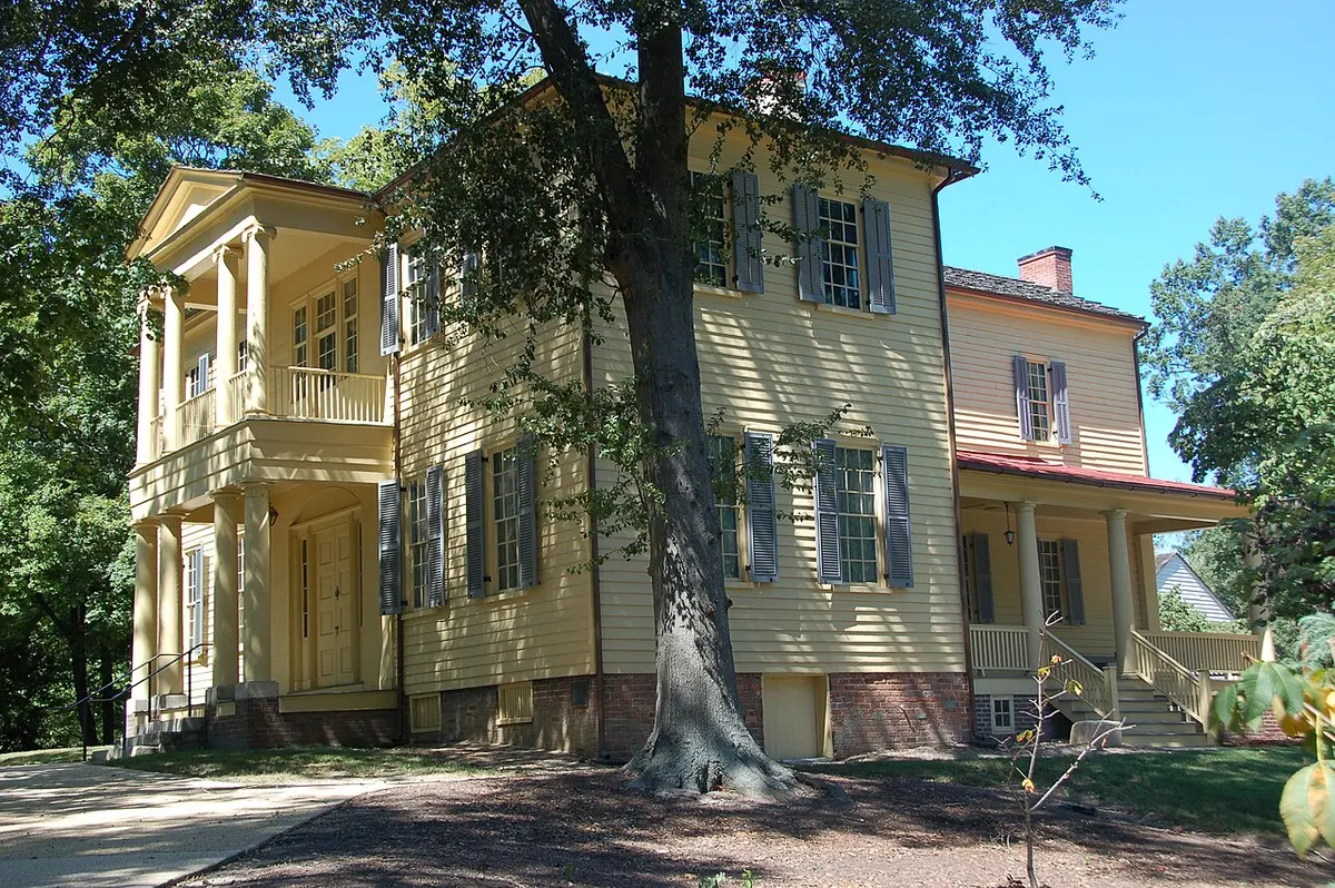 The Mordecai House in Raleigh, North Carolina, a white Greek Revival house with columned porches