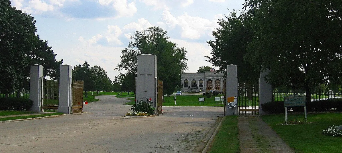 The entrance and fence of Resurrection Cemetery on Archer Avenue in Justice, Illinois