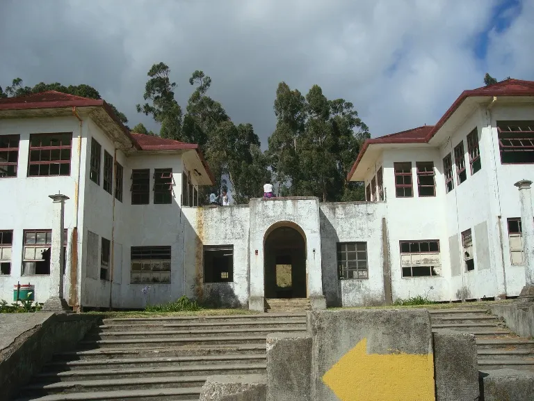 The weathered main façade of the former Sanatorio Durán in the mountains of Cartago, Costa Rica