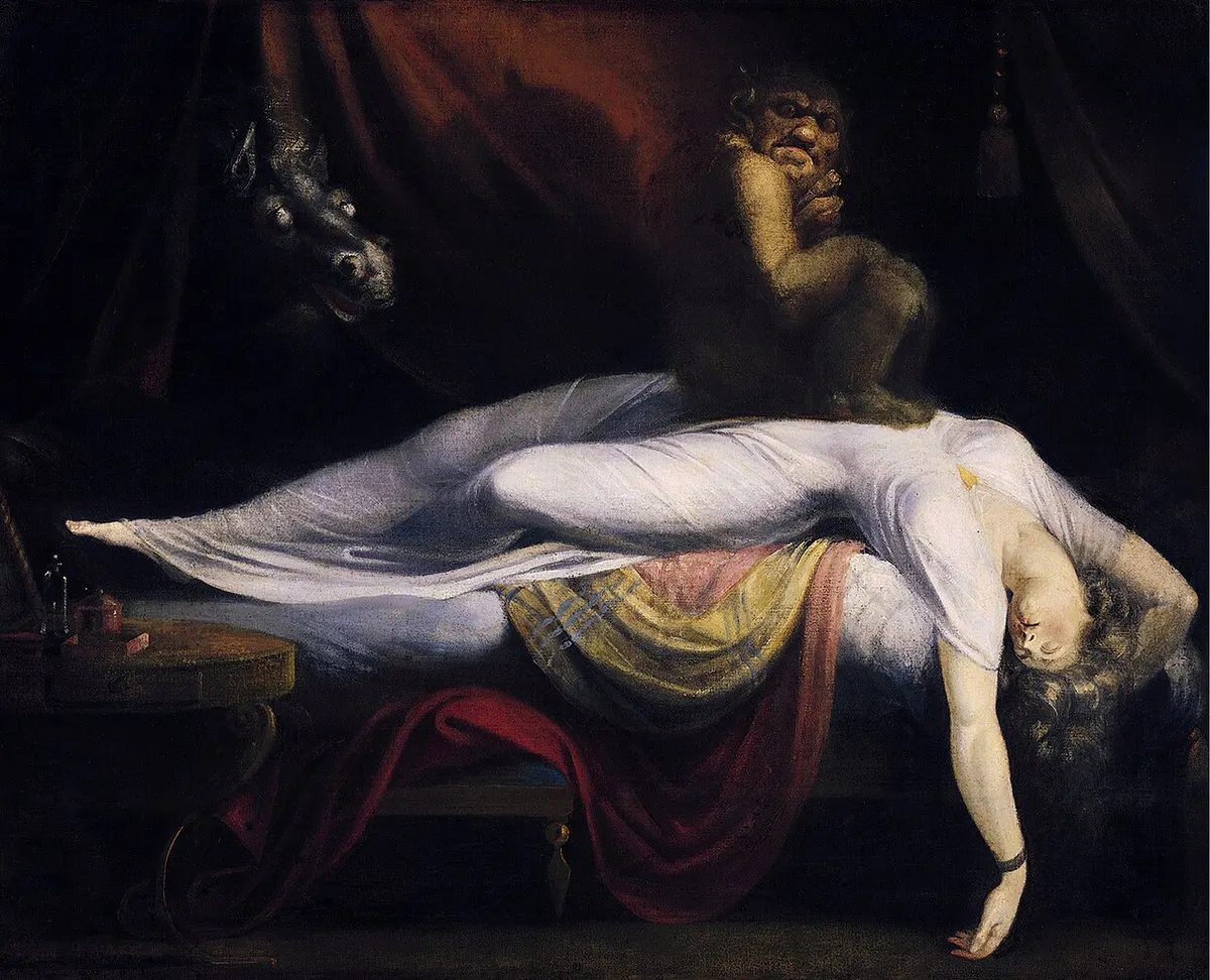 Henry Fuseli’s painting The Nightmare: a woman lies asleep across a bed while a dark demon crouches on her chest and a horse’s head looks through the curtains