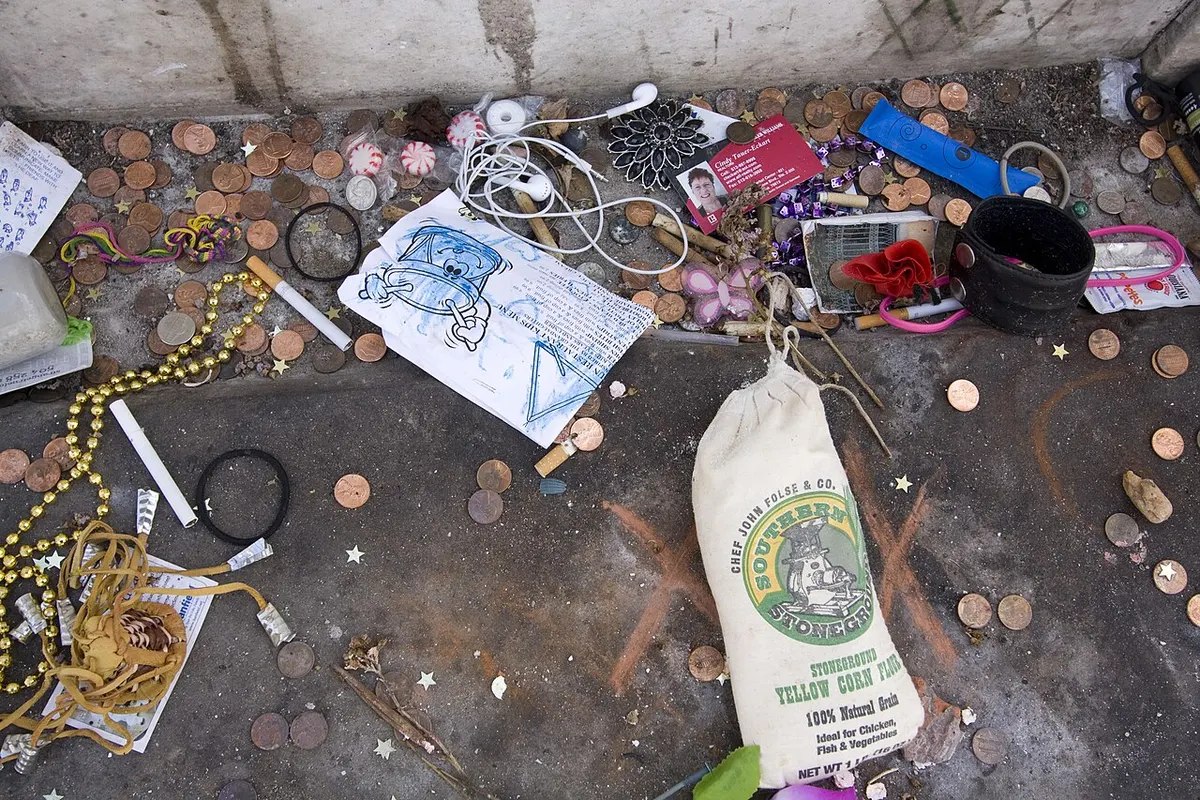 Offerings left at the whitewashed tomb believed to hold Marie Laveau in St. Louis Cemetery No. 1