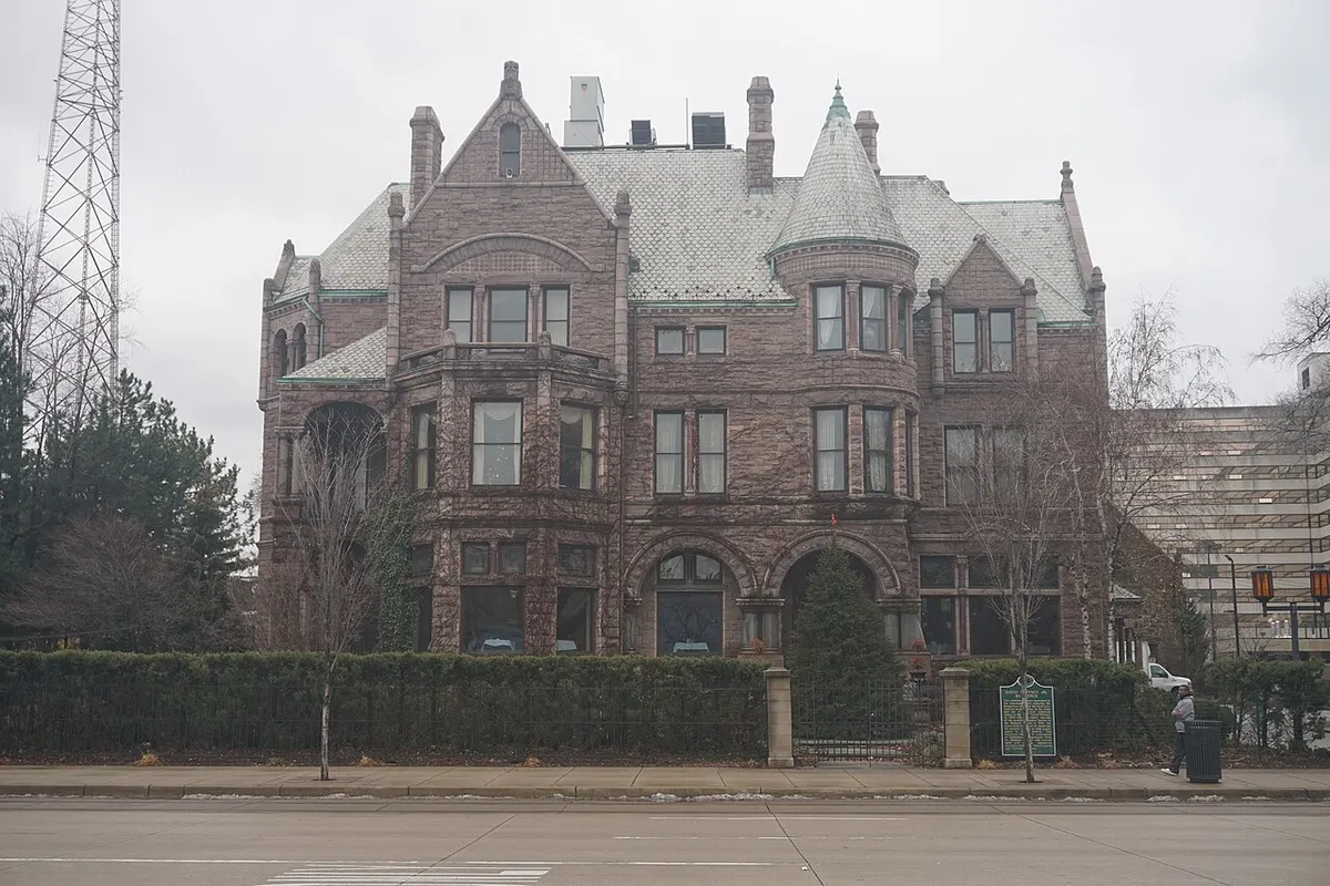The pink stone Romanesque Revival David Whitney House on Woodward Avenue in Detroit