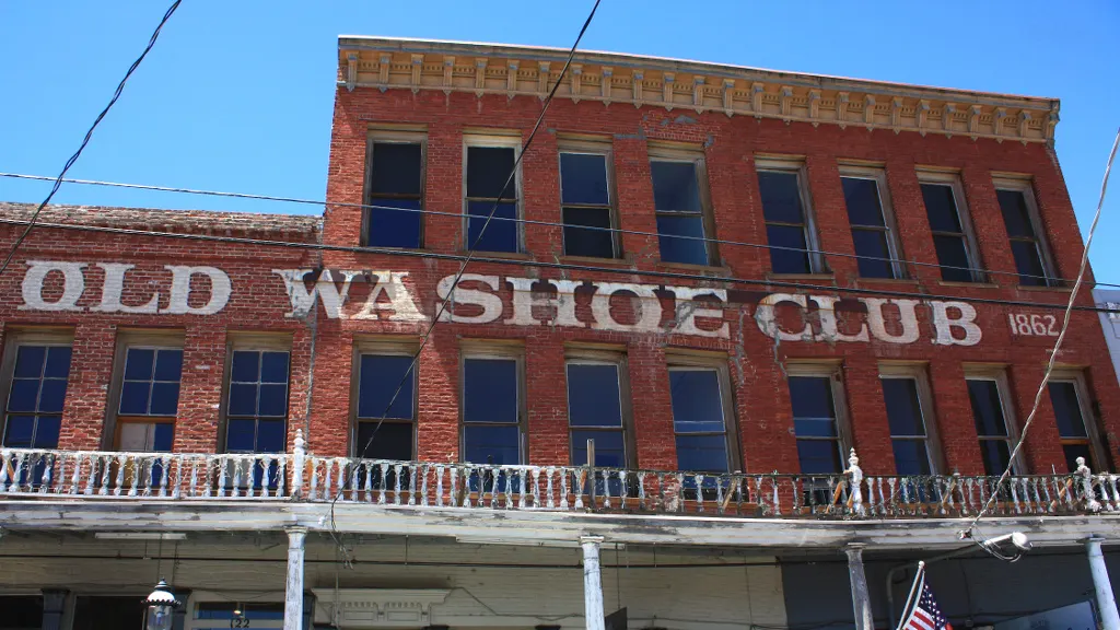 The brick front of the Old Washoe Club on C Street in Virginia City, Nevada