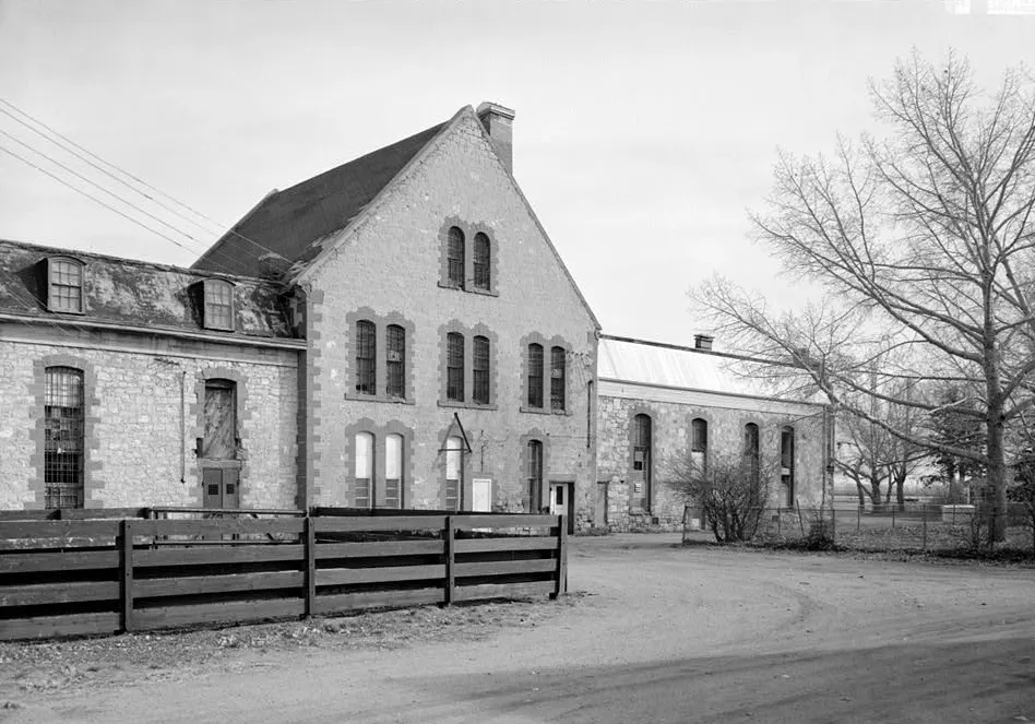 The sandstone main façade of the Wyoming Territorial Penitentiary in Laramie