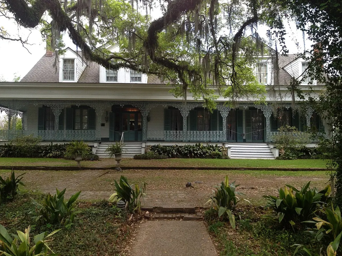 Front view of the Myrtles Plantation house among trees
